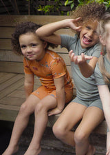 Unisex Short Sleeve Pyjamas - Orange Dino Dreamers set - Morning Marvels